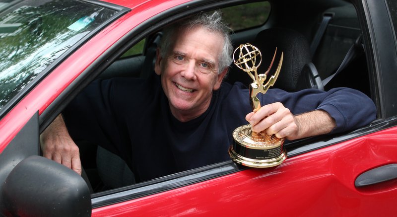 John Drake Robinson with Emmy Award